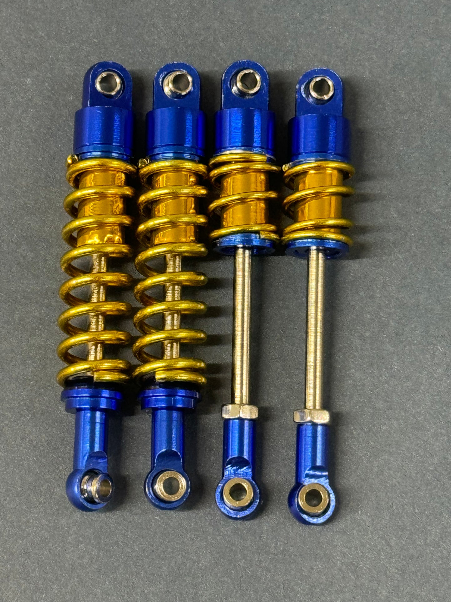 Skunks Hobbies Hopper Shocks Solid Rears Gold Spring